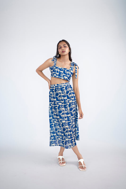 Abstract printed shoulder tie strings top with slip on skirt