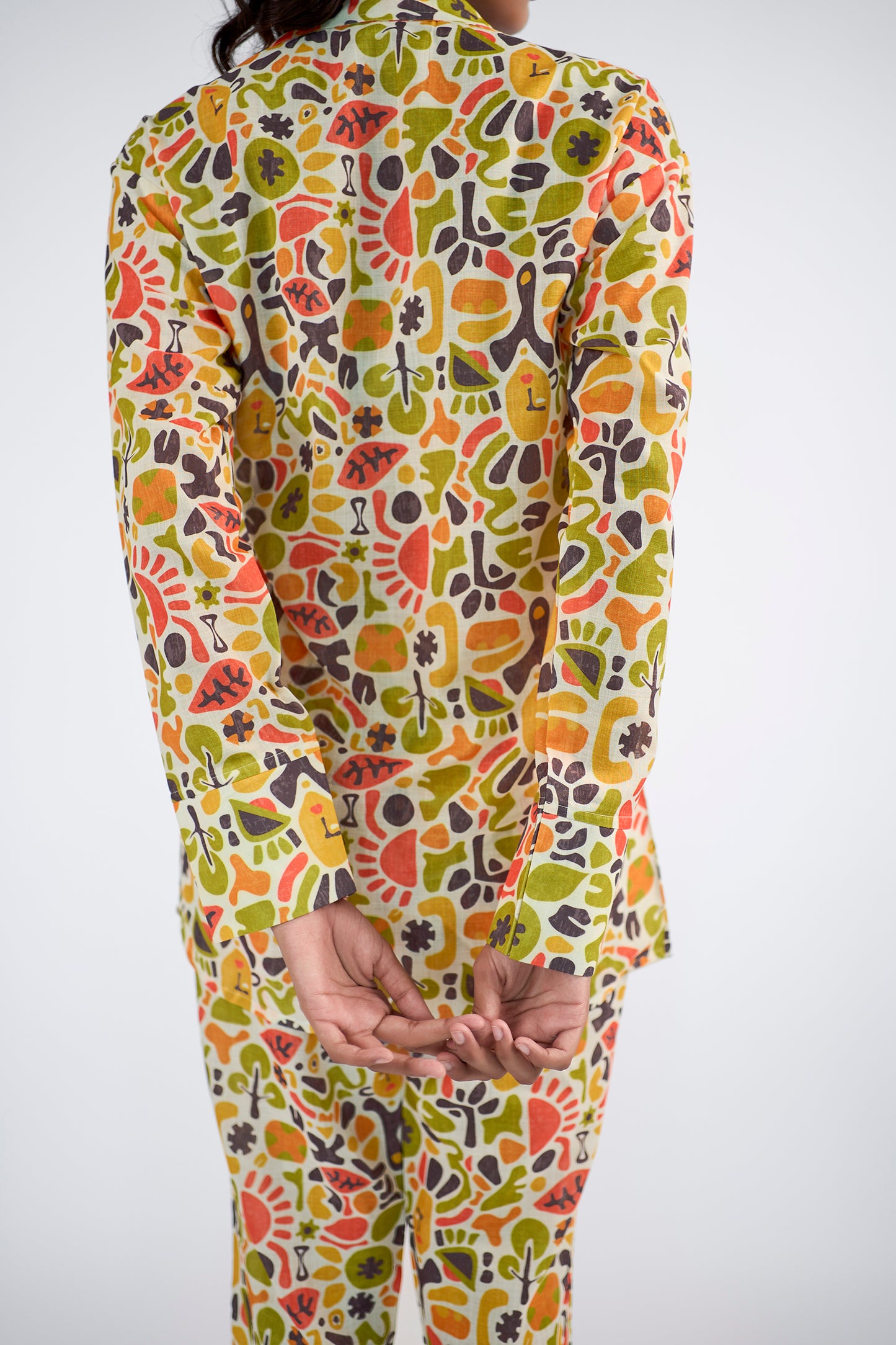 Printed collared shirt with bell-bottom pants