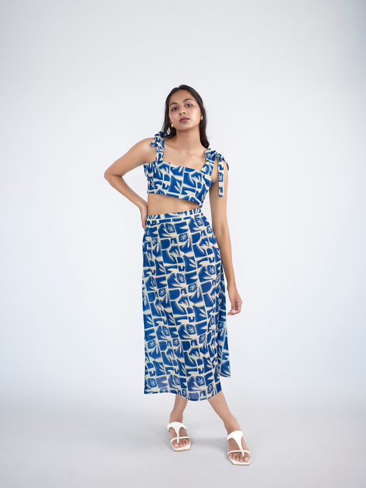 Abstract printed shoulder tie strings top with slip on skirt