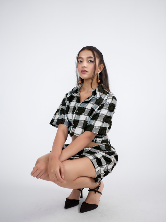 Checker-ed boxy-fit crop shirt paired with a skort