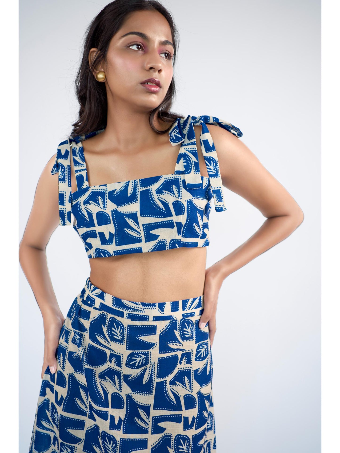 Abstract printed shoulder tie strings top with slip on skirt