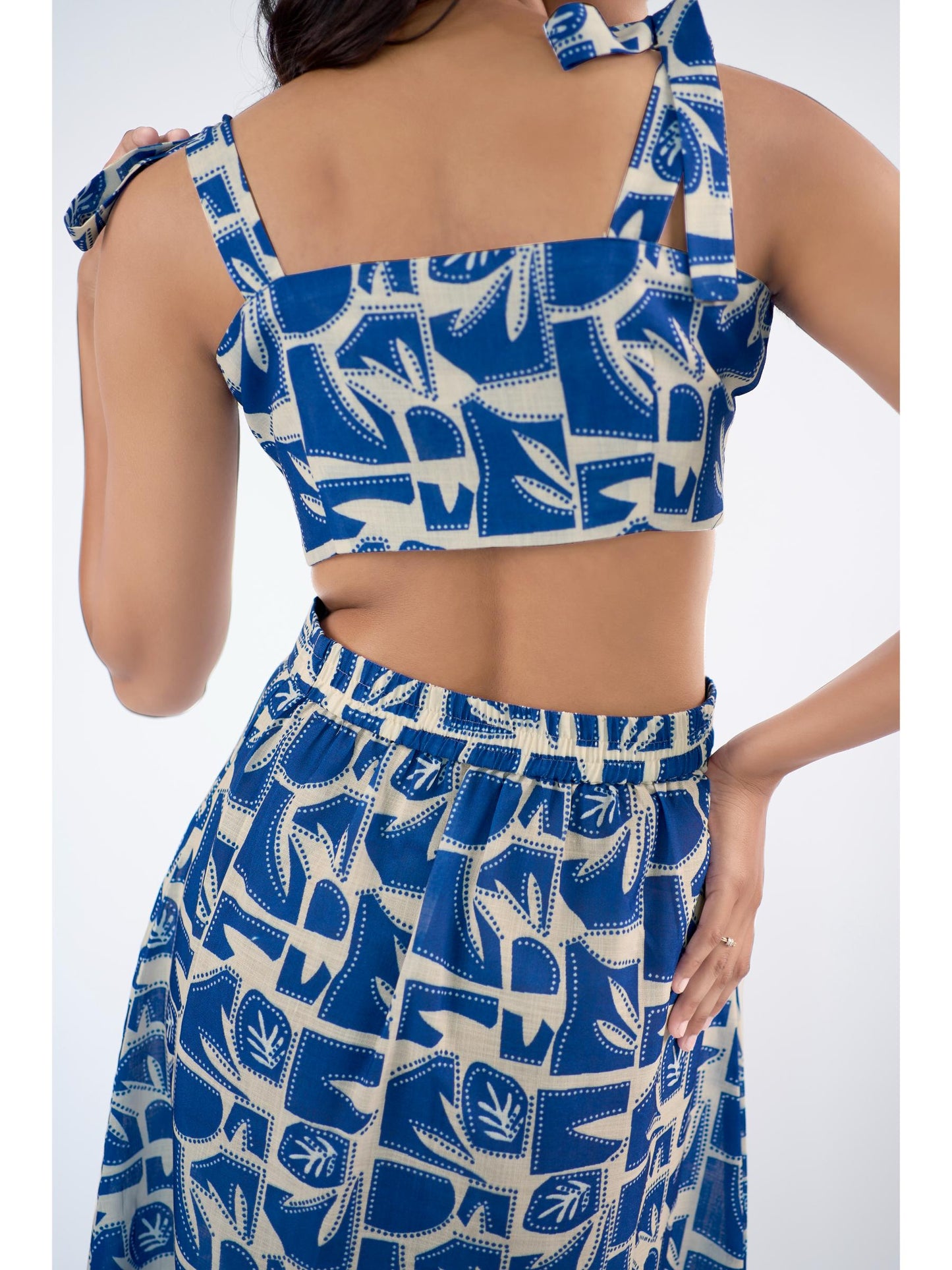Abstract printed shoulder tie strings top with slip on skirt