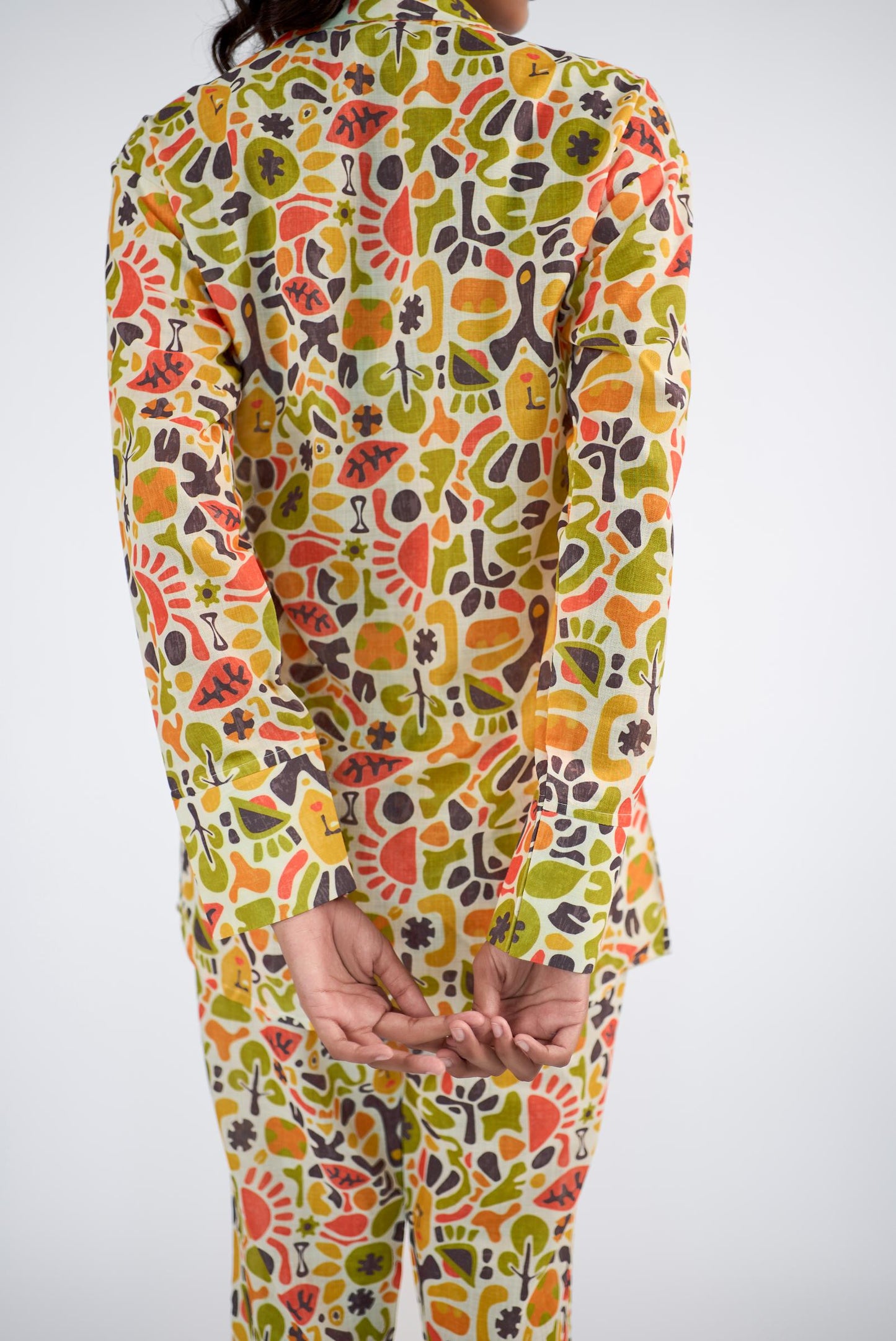 Printed collared shirt with bell-bottom pants