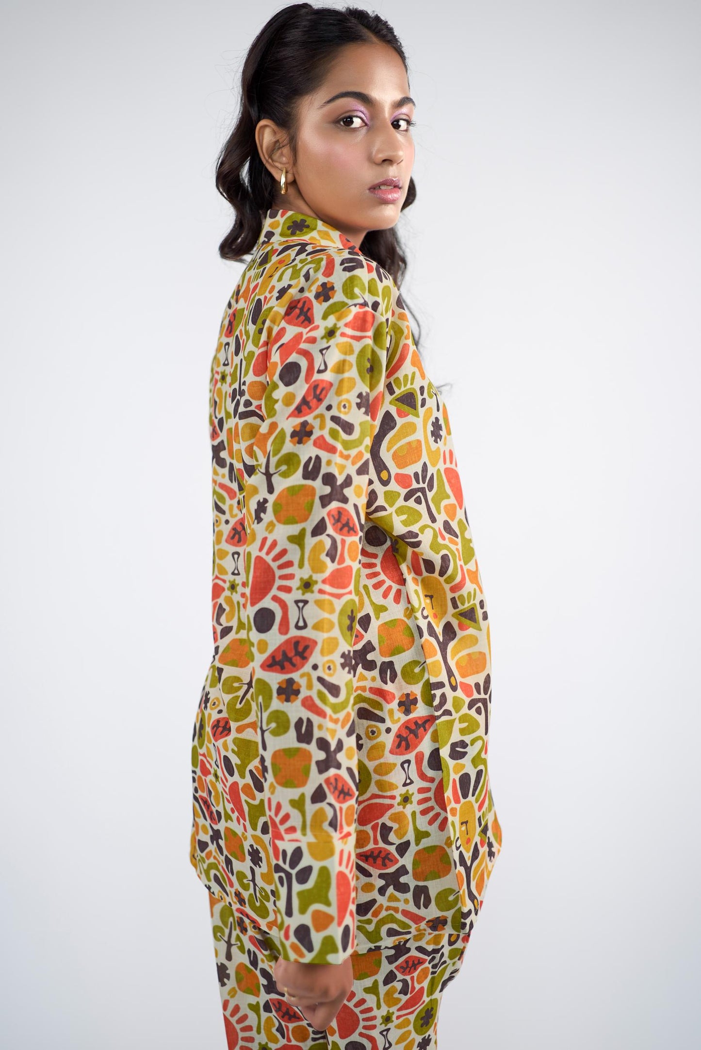 Printed collared shirt with bell-bottom pants