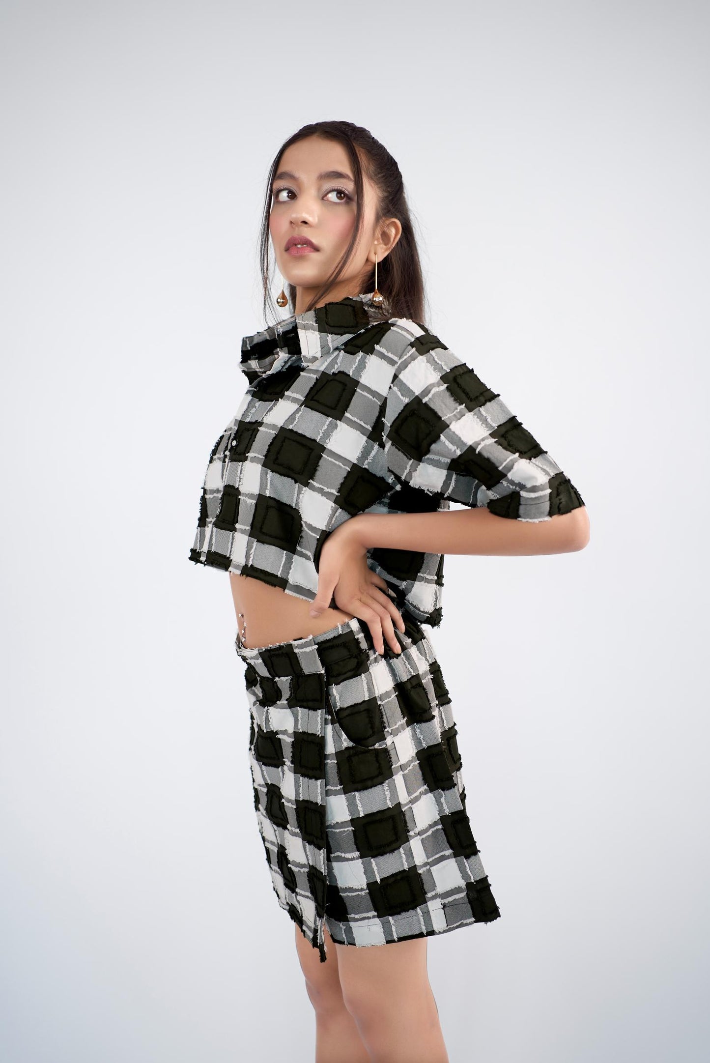 Checker-ed boxy-fit crop shirt paired with a skort