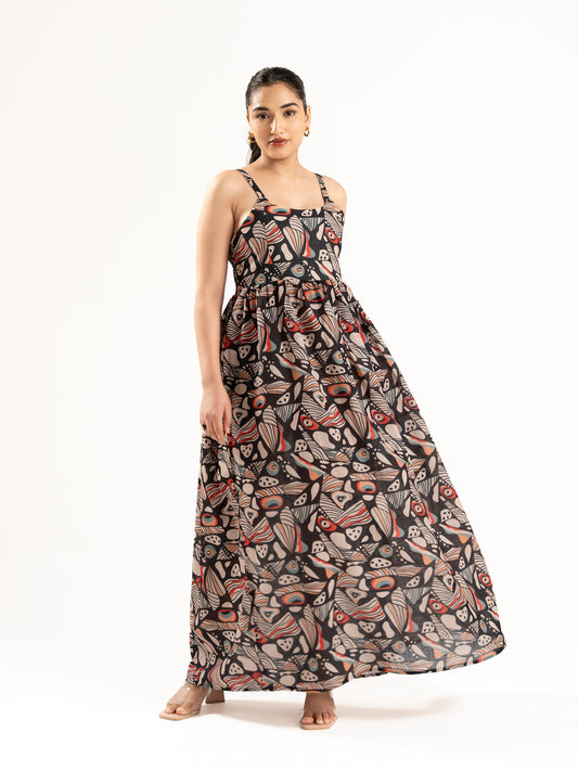 A flowy full-length spaghetti strap maxi dress