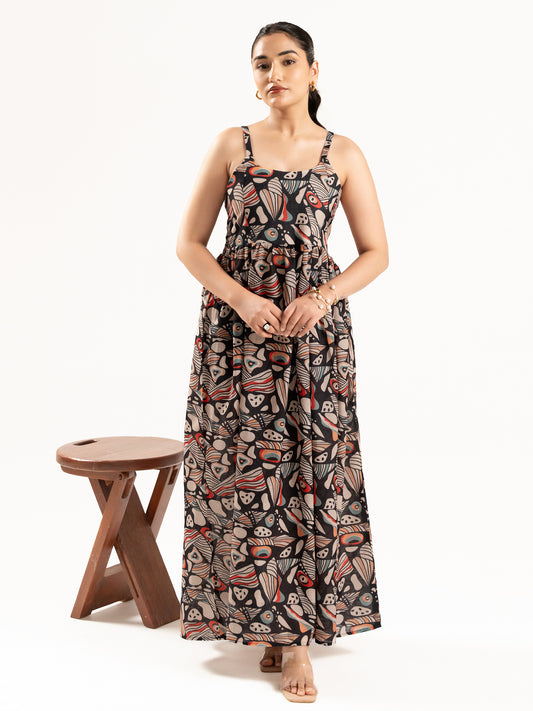 A flowy full-length spaghetti strap maxi dress