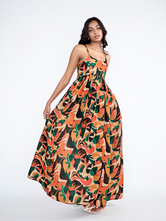 A flowy full-length spaghetti strap maxi dress