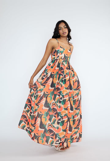 A flowy full-length spaghetti strap maxi dress