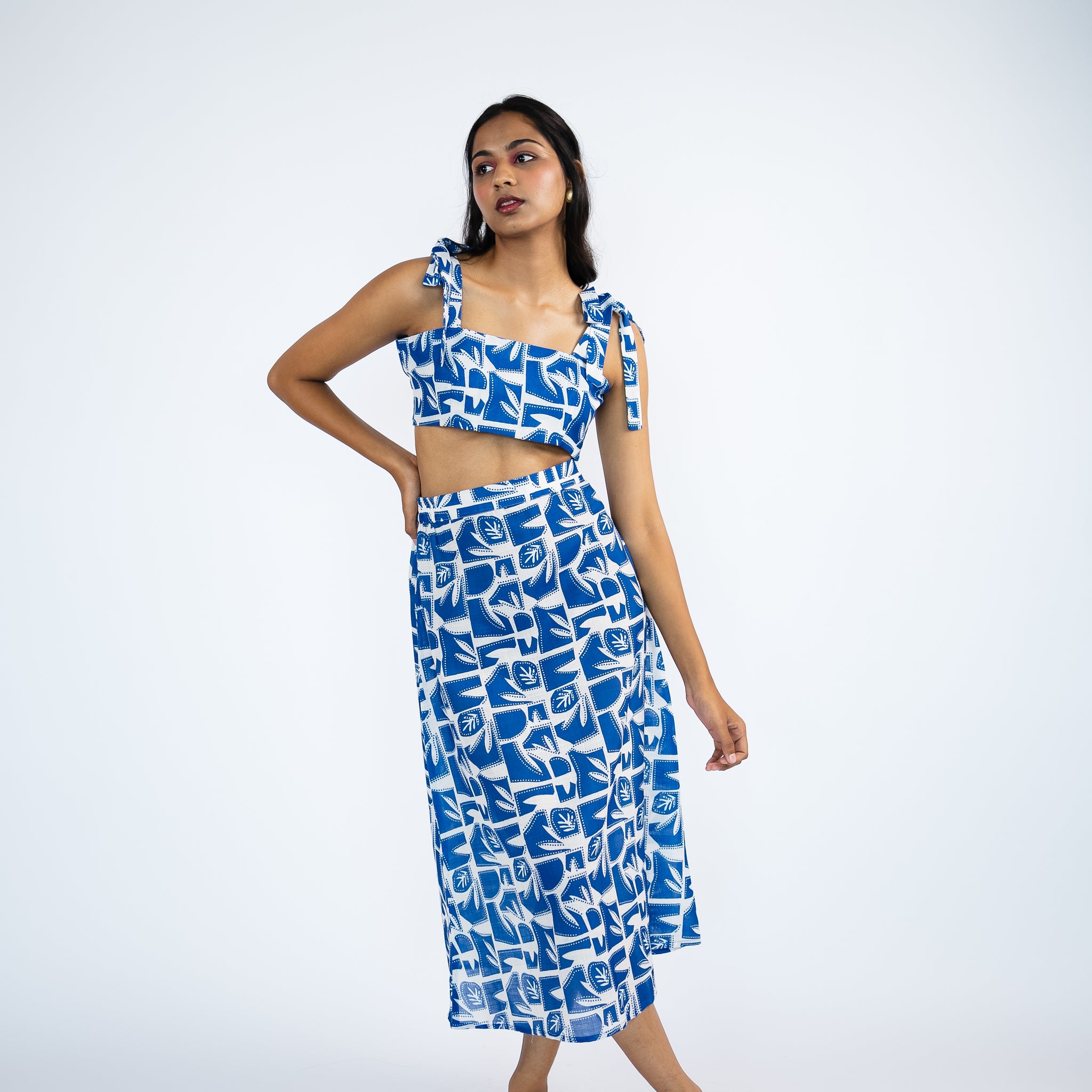 Abstract printed shoulder tie strings top with slip on skirt