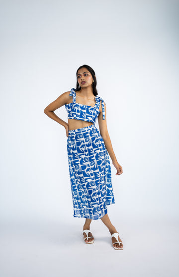 Abstract printed shoulder tie strings top with slip on skirt