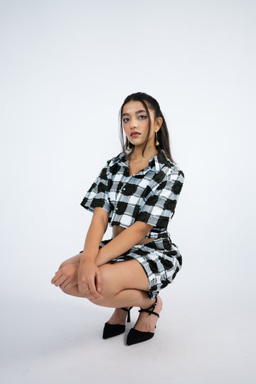 Checker-ed boxy-fit crop shirt paired with a skort